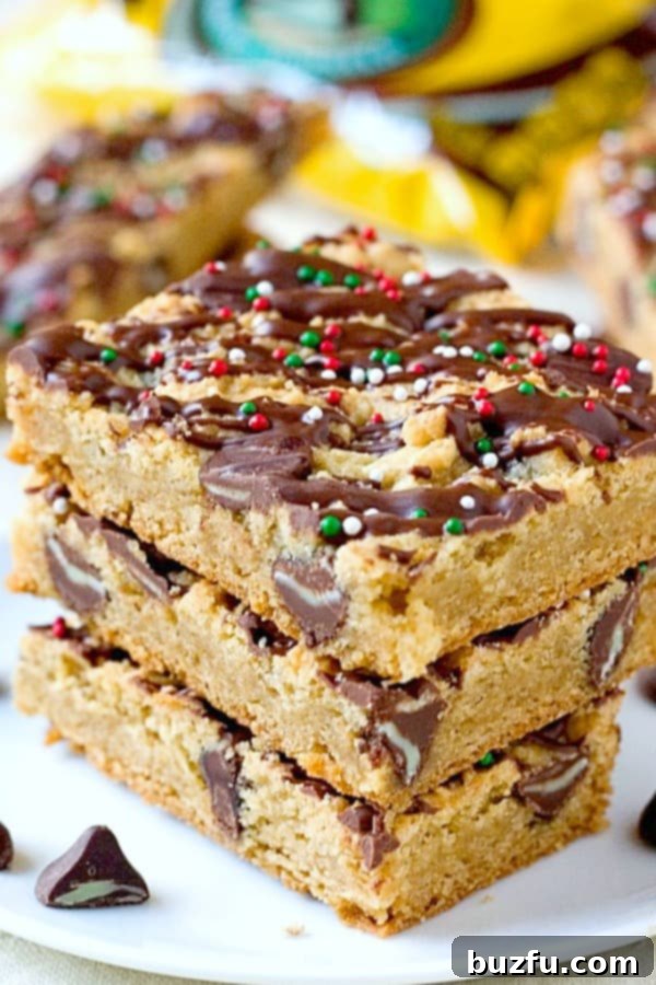 A plate of freshly baked Mint Chocolate Chip Cookie Bars, ready to be enjoyed.