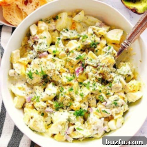 Dill Pickle Chicken Salad Delight 7 Egg salad with avocado in a bowl.